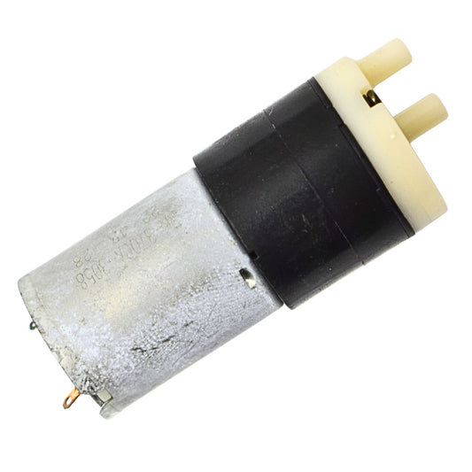 Mechanical component with black and beige parts on a white background